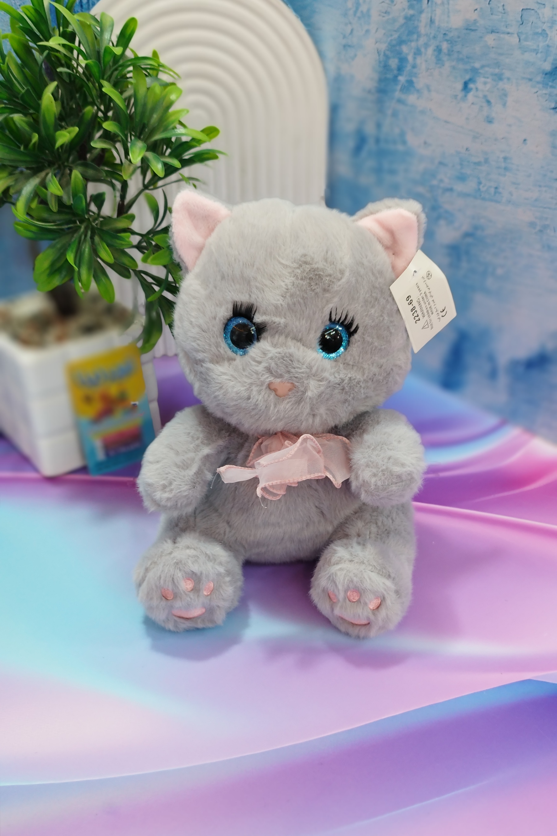 عروسک گربه مژدار