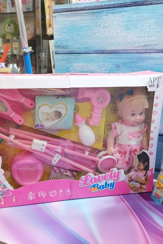 عروسک بیبی بورن همراه با کالسکه برند APT TOYS